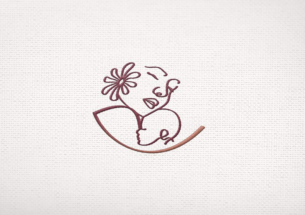 Mamaemoi identité visuelle textile 2 vesta graphiste symbole logo textile broderie graphisme